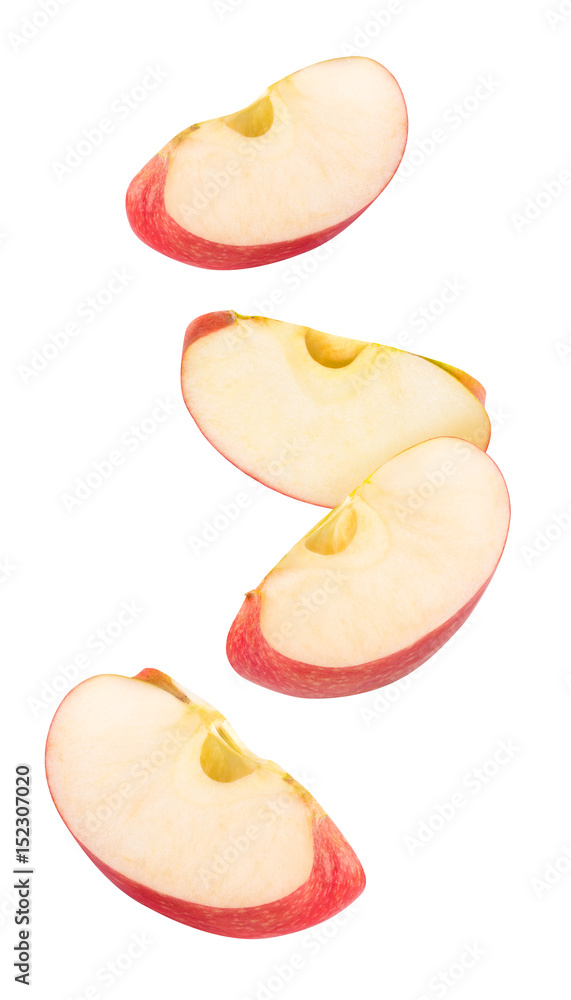 Poster isolated flying apple wedges. four falling pieces of red apple fruit isolated on white background wi