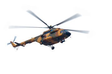 The helicopter in the sky on a white background. © sergeyku
