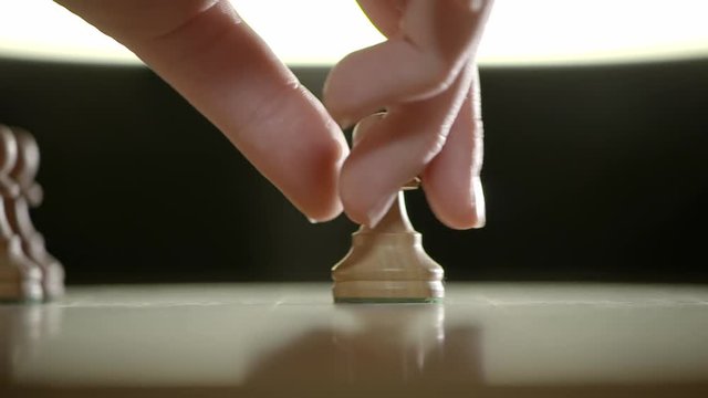 Chess game_03: Two clips with black and white pawns moved during a chess game