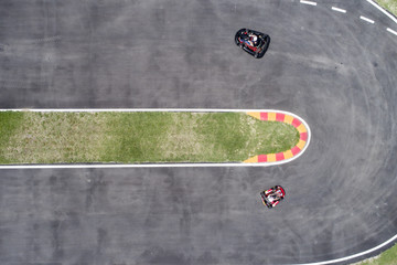 Cars racing on track