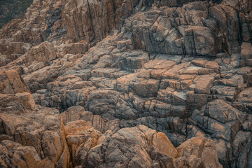Texture of the rock stone cliff background.