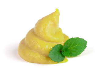 Naklejka na ściany i meble mustard sauce with a mint leaf isolated on white background close-up