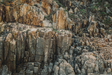 Fototapeta na wymiar Texture of the rock stone cliff background.