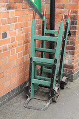 A Pair of Vintage Sack Trolleys at a Railway Station.