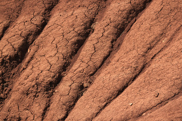 Traces of the natural erosion on the clay mountain slope