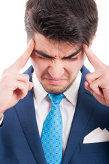 Closeup portrait of young lawyer suffering from headache