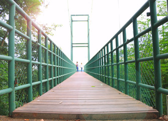 Rope bridge wood floor, Sweetheart on the steel bridge with blurred style