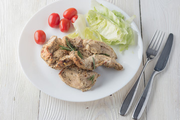Grilled chicken breast with fresh vegetables