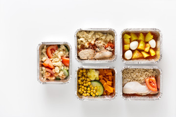 Healthy food take away in boxes on white background