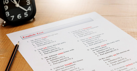 english exam on table with pencil