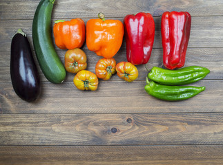 Various vegetables background on wooden background. Healthy food. Copy space.
