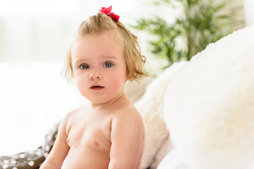 Interested baby having fun at home