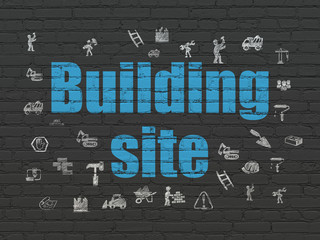 Constructing concept: Building Site on wall background
