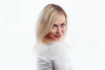 Naklejka premium Beautiful woman smiling face close up studio on white.
