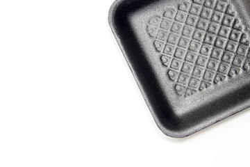 Black foam tray isolated in white background