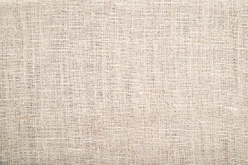 Light beige fabric texture for background. Vintage. Horizontal frame
