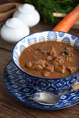 Goulash soup with pork and mushrooms.