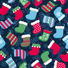 Colorful christmas socks and snowflakes seamless pattern.