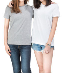 Two girls wearing t-shirt with white background. Clipping path