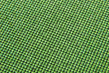 Canvas of green rhinestones. Background.