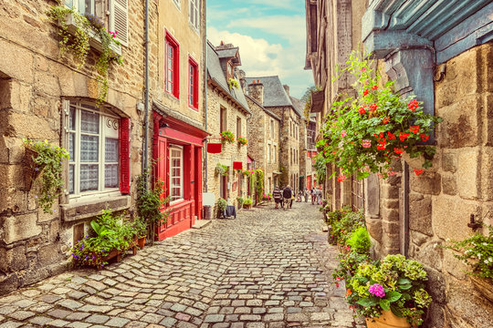 Fototapeta Scenic alley scene in an old town in Europe