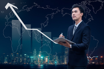 Business growth concept, business man taking note with city scape background