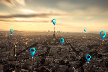 Location pin above cityscape and network connection concept at Paris, France.