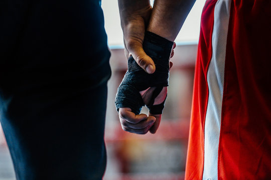 Close-up Hand Boxer And Referee Winner Announced In Boxing Fight