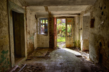 Fototapeta na wymiar Open door of abandoned basement