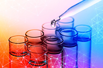 science dropper and laboratory test tubes