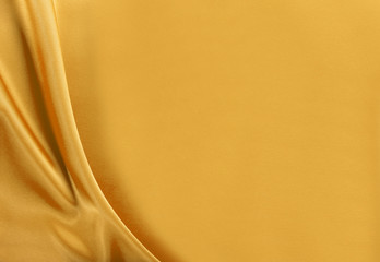 Gold silk satin.