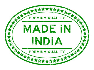Grunge green premium quality made in India oval rubber seal stamp on white background