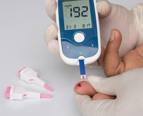 blood glucose meter, the blood sugar value is measured on a finger