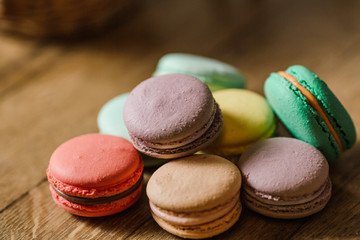 vivid color macaroons on wooden table