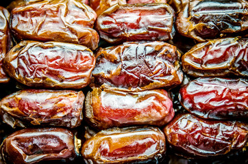 Macro photo of sweet dried big dates.