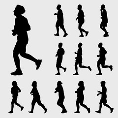 Man and Woman Running Silhouettes Vector