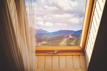 Landscape view of the mountains through the window