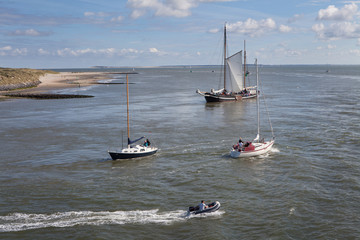 Boats and sailing ships near the island of Vlieland. Wadden island. at the Waddenzee Netherlands © A