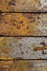Abstract Close Up of Rusted Metal Pegs in a Row