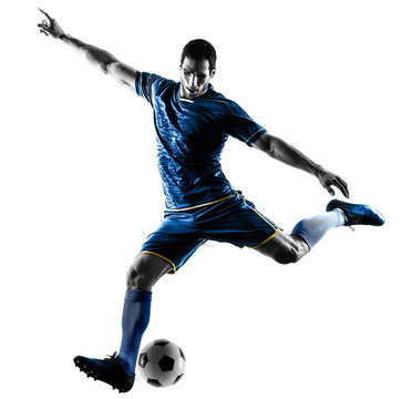 Fototapeta one caucasian soccer player man playing kicking in silhouette isolated on white background