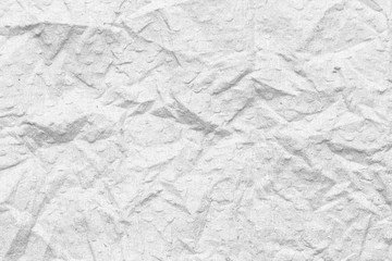 Crumpled white paper texture background.