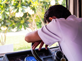 The bus driver fall asleep on the steering wheel.