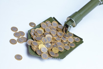shovel with money