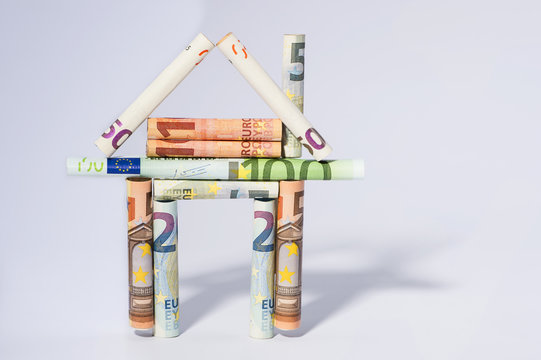 house mortgage creative concept represented by house of european money currency