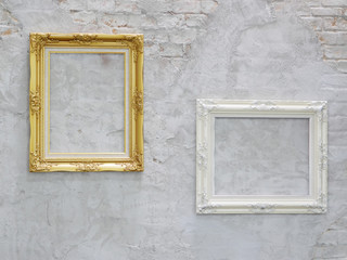 gold and white picture frame on wall