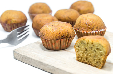 Banana cake and fork with white background.