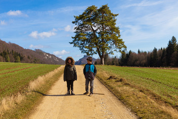 Obraz premium Children in nature, agricultural landscape, fields in autumn