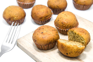 Banana cake and fork with white background.