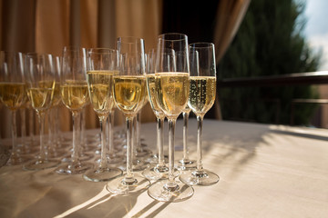 Champagne glasses on table. Catering service for wedding party, alcohol party and other holidays and events