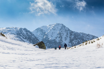 Winter scenery in the Transylvanian Alps with storm clouds and fresh snow